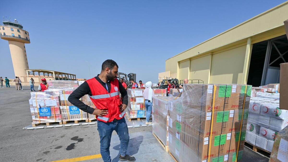 Food and medical supplies are unloaded at Al Arish Air Base in Egypt.