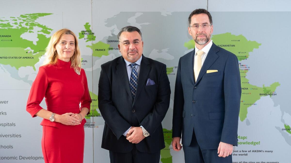 Nicoleta Teodorovici, Consul General of Romania in Dubai (left), Tracy Reynolds, Consulate General of Canada in Dubai (right) with Aziz Merchant, President of Prince Agra Khan's Shia Imami Ismaili Council for the United Arab Emirates, pose at the Ismail center from Dubai on Thursday.