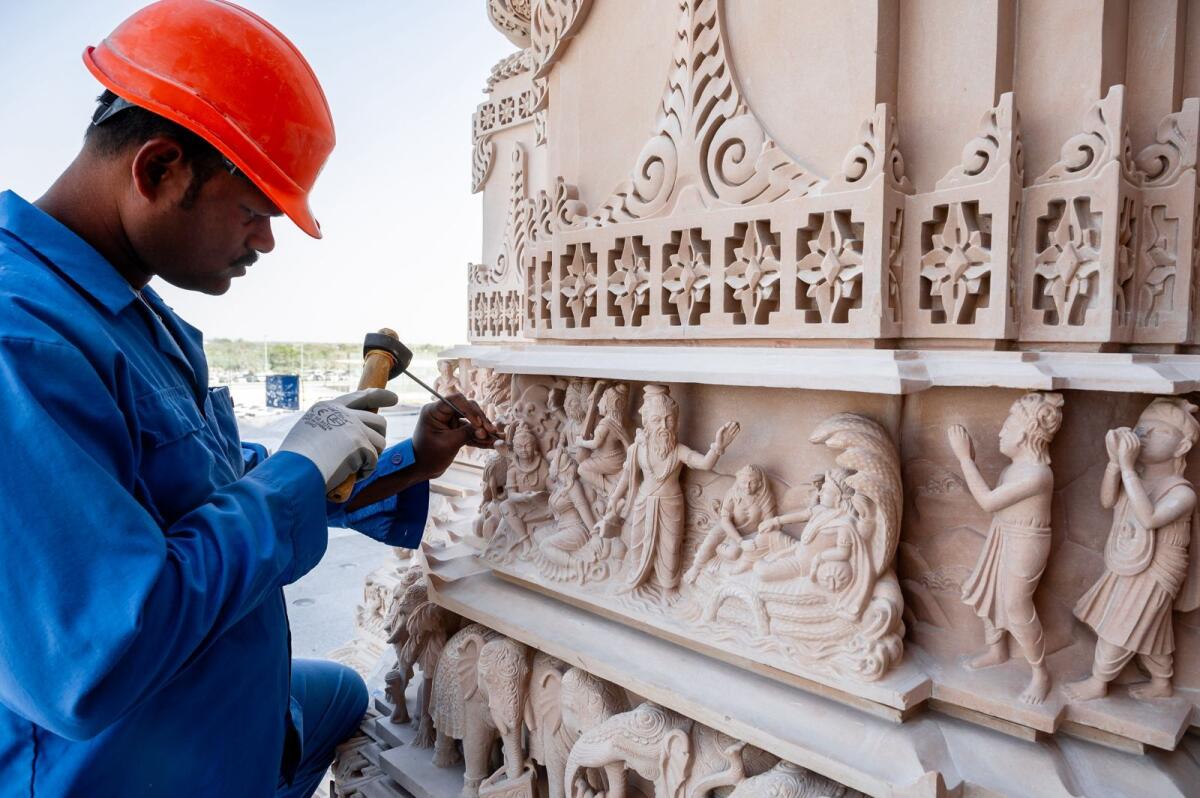 Artisans put finishing touches to stone carvings depicting stories from Hindu scriptures at BAPS Hindu Mandir in Abu Dhabi.  Photo: Neeraj Murali