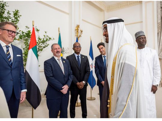 President His Highness Sheikh Mohamed bin Zayed Al Nahyan (R) speaks with new ambassadors after receiving diplomatic credentials at the Sea Palace